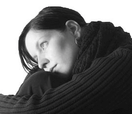 A young adult female looking thoughtful